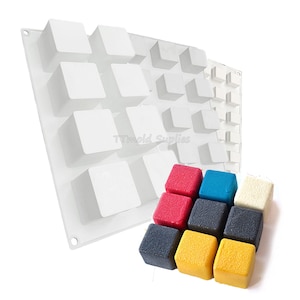 May include: A white silicone mold with 24 square cavities for making small cubes. The mold is shown with eight colorful cubes made with the mold.