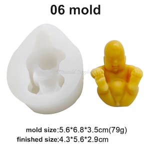 May include: A white silicone mould for making a baby figurine. The mould is 5.6 cm by 6.8 cm by 3.5 cm and weighs 79 grams. The finished figurine will be 4.3 cm by 5.6 cm by 2.9 cm.