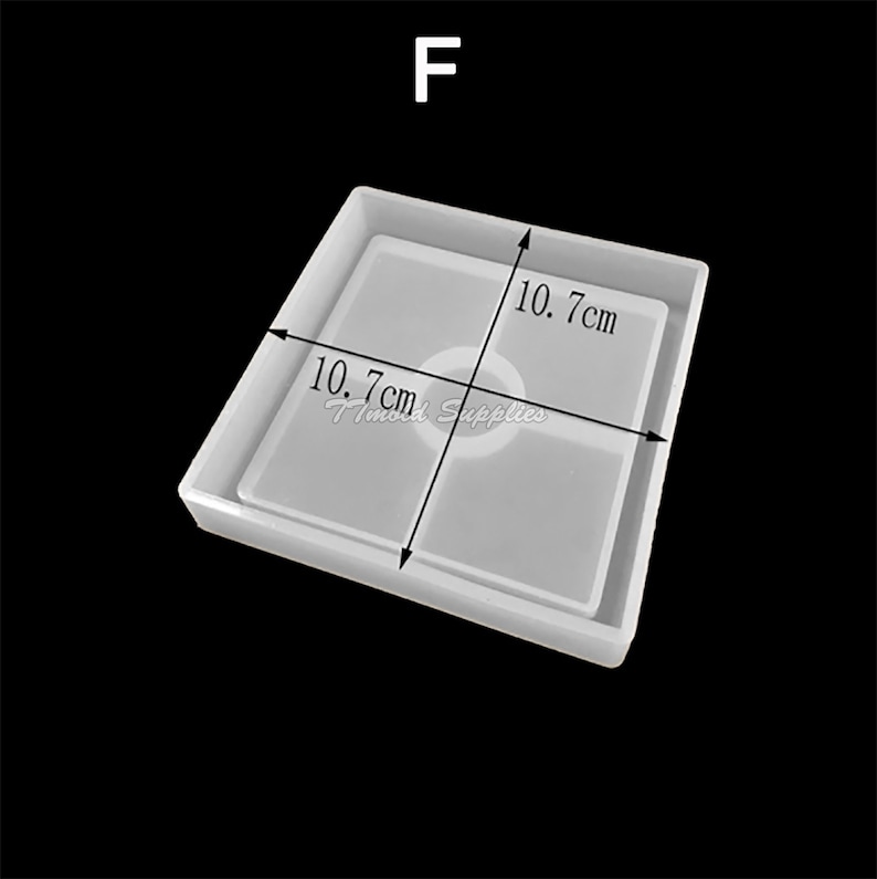 May include: A clear silicone mold for resin casting, shaped like a square with a smaller square inside. The mold measures 10.7 inches by 10.7 inches.