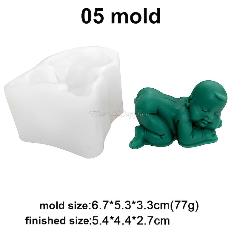 May include: A white silicone mould for making a sleeping baby figurine. The mould is 6.7 cm by 5.3 cm by 3.3 cm and weighs 77 grams. The finished figurine is 5.4 cm by 4.4 cm by 2.7 cm.