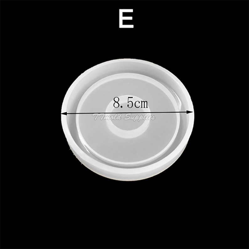 May include: A white silicone mold for resin crafts. The mold is round and has a diameter of 8.5 inches. The mold is designed to create a circular tray or coaster.