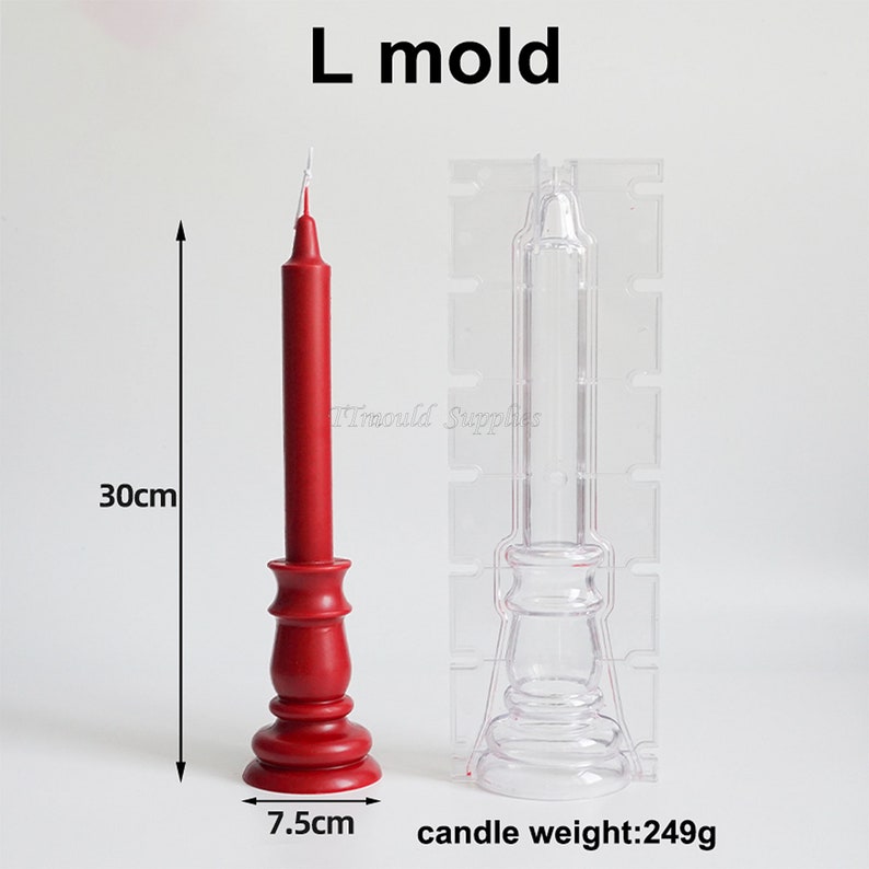 May include: A clear plastic candle mold with a red candle in a matching mold. The candle is 30 inches tall and the base is 7.5 inches wide. The candle weighs 249 grams. The mold is labeled "L mold".