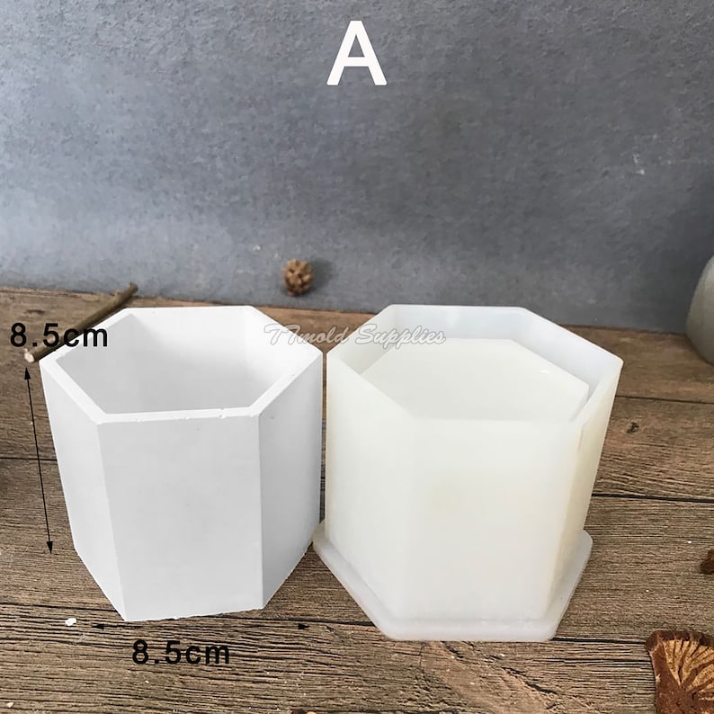 May include: Two white silicone molds for making hexagonal planters. Each mold is 8.5 inches in diameter.