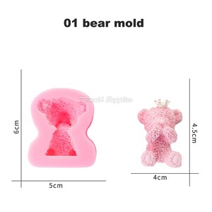 May include: Pink silicone mold for making a teddy bear with a crown. The mold is 6 cm tall and 5 cm wide. The finished teddy bear is 4.5 cm tall and 4 cm wide.