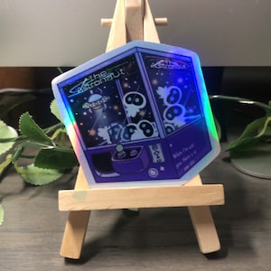 The Astronaut Holographic Claw Machine Sticker