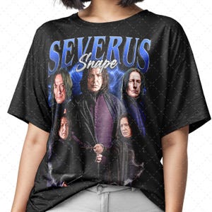 May include: Black t-shirt with a graphic print of Severus Snape and other characters from the Harry Potter series. The text "Severus Snape" is printed in blue and white letters.