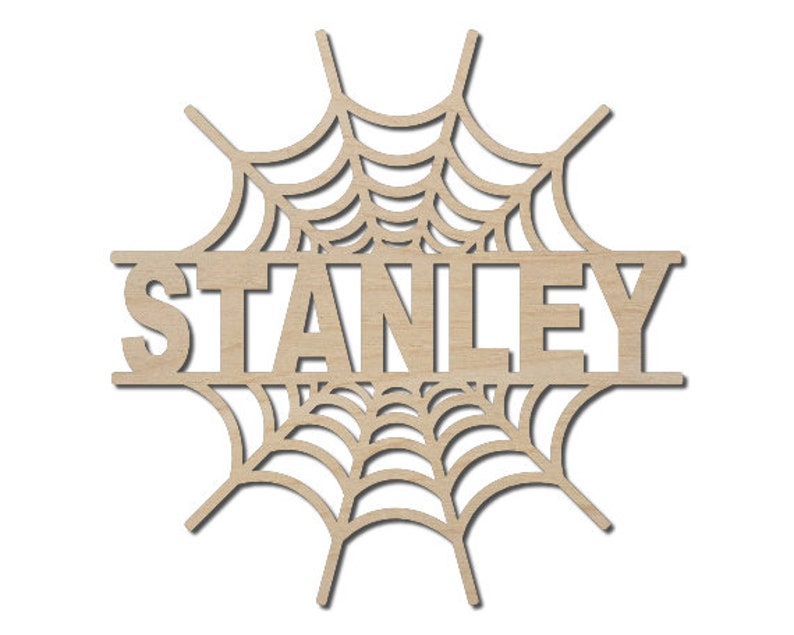 May include: A wooden cutout of a spiderweb with the name "STANLEY" in the center. The cutout is a popular Halloween decoration.