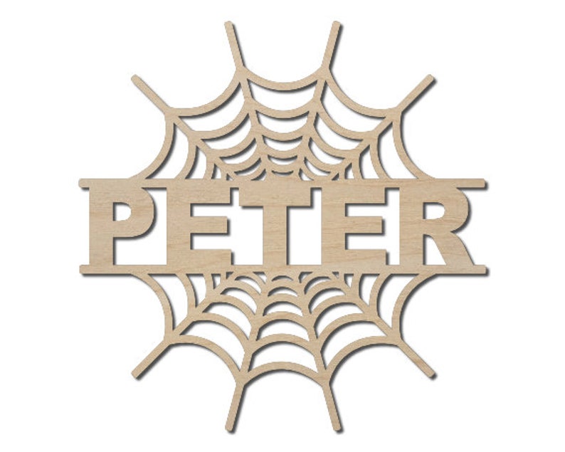 May include: A wooden cutout of a spider web with the name "PETER" in the center. The cutout is a light brown color and is perfect for decorating for Halloween.