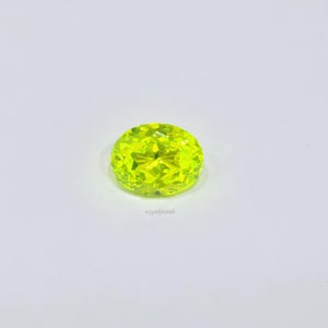 Lab Grown Yellow LuAG (Lutetium Aluminum Garnet)  Gemstone: 9.94 Carat Oval Cut