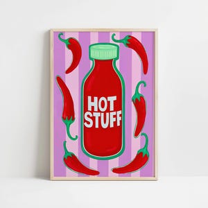 May include: A red bottle with a green lid and the words "HOT STUFF" printed on it. The bottle is surrounded by red chilli peppers on a pink and white striped background.