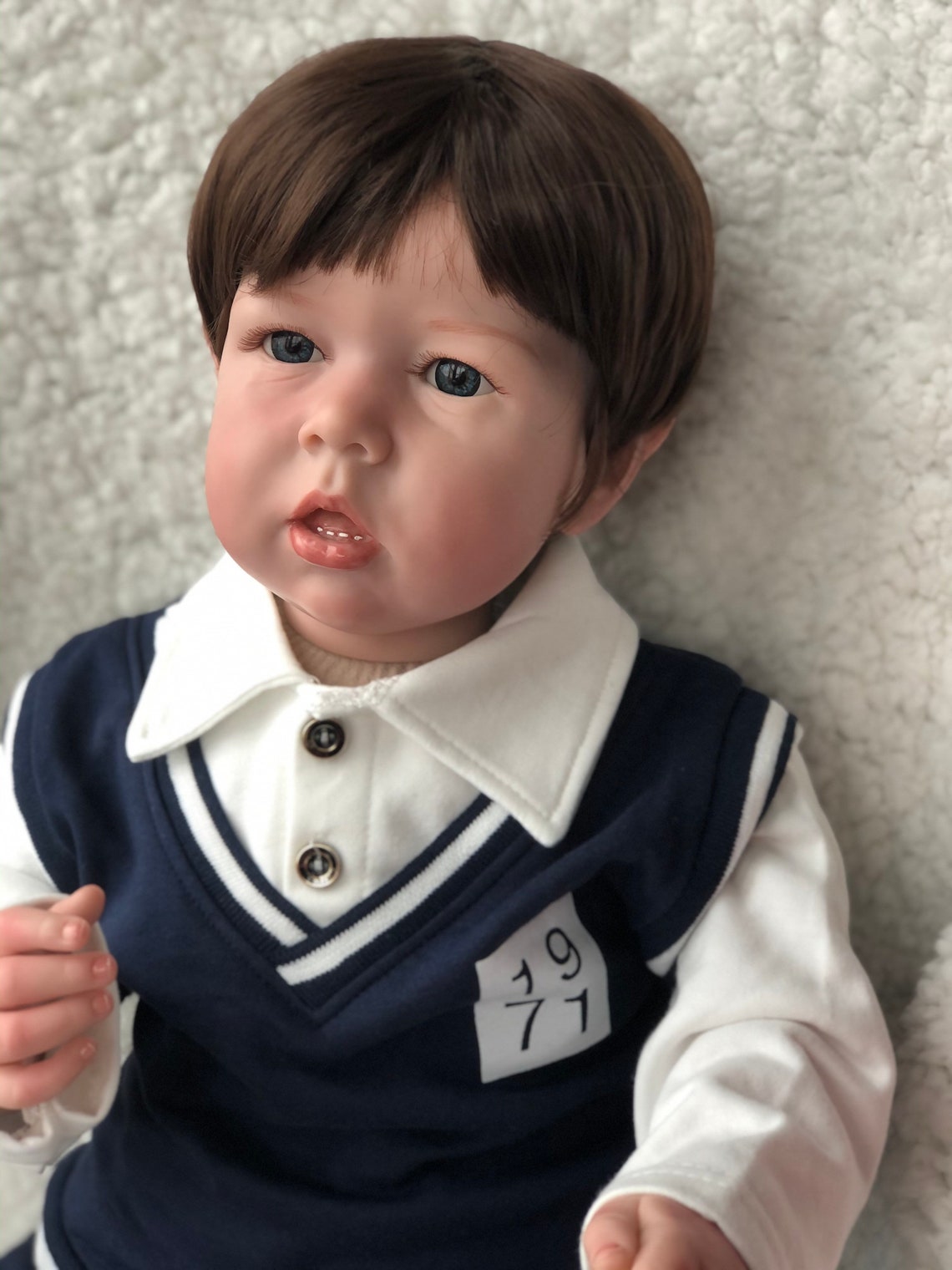 singing liam doll
