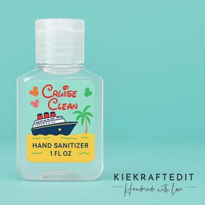 May include: A clear hand sanitizer bottle with a white cap. The label features a cruise ship illustration, the words "Cruise Clean", and "Hand Sanitizer 1 FL OZ". The background is a light teal color.