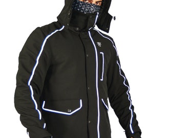 May include: A black jacket with white reflective piping. The jacket has a hood and a zip closure. The jacket has a logo on the left chest that says "XC".