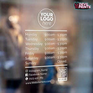 May include: A white sign with black text on a glass door. The sign displays business hours for a shop, including the days of the week and the hours of operation. The sign also includes a logo placeholder, contact information, and a QR code.