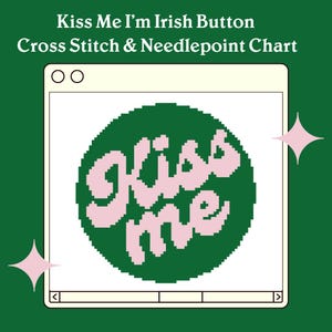 May include: A green and pink cross stitch or needlepoint chart featuring the text "Kiss Me" in a circle.