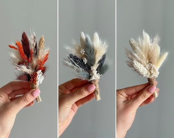 Boho dried flowers groom boutonniere for wedding with natural white, terracotta orange and grey preserved flowers