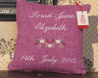 Harris Tweed Cushion in a Raspberry Pink Herringbone, with an Example of Personalised Embroidery