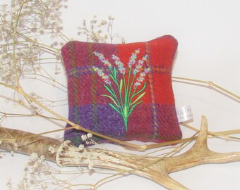 Harris Tweed mini lavender cushion in a bright red check embroidered with lavender flowers.