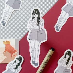 Manga Girl Reading & Shopping Matte Vinyl Sticker