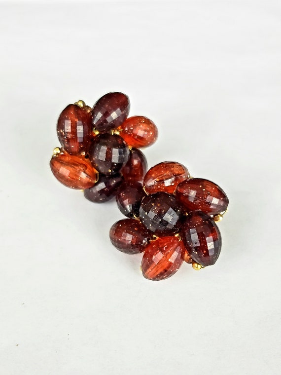 1950s Pinwheel Dark Cherry and Amber Faceted Luci… - image 1