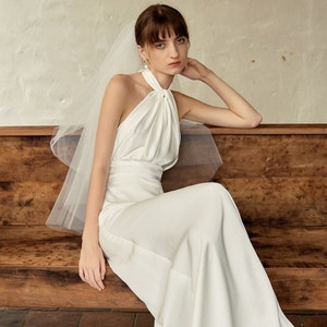 Satin wedding dress with halter neck| Satin elegant wedding dress| Unique halter neckline bridal gown| Satin bridal gown| Satin bridal gown