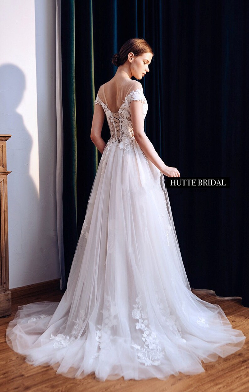 A-line White Off the Shoulder Wedding Dress With Flower Embroidery main image 0