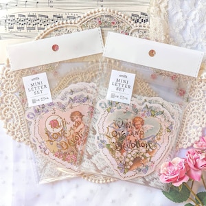 Juego de letras con forma de ángel y flor, 8 letras troqueladas con forma de corazón y líneas de escritura, de plástico, con sobres blancos para escribir a mano, kit para correo postal, amigo por correspondencia