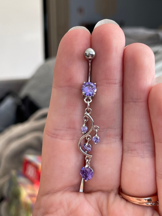 Surgical Steel Floating Gem within a Caged Heart Dangling Belly Button Navel Ring Surgical Steel Floating Gem within a Caged Heart Dangling Belly Button Navel Ring