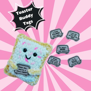 May include: A plush toy shaped like a toaster pastry with a smiling face and the text "Crust me, you're a Sweet-TART!"  The toy is surrounded by five small, silver, toaster-shaped tags with various sayings, including "I have FILLINGS for you." and "It's what's INSIDE that counts!"