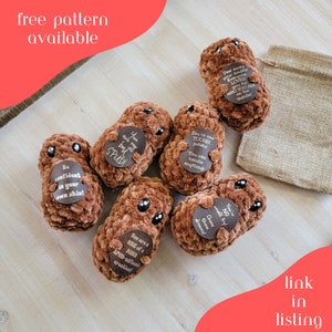 May include: Seven brown crocheted potato-shaped plushies with embroidered faces and inspirational messages. The messages include "You are my best SPUD!", "Be confident in your own skin!", "You're one TOUGH potato! You can handle anything!", "You're NO small fry! Chase those dreams!", "Peel away your doubts, everyone LOVES you for WHO YOU ARE on the inside!" and "You are a ONE of a KIND SPUD-aifficant creation!"