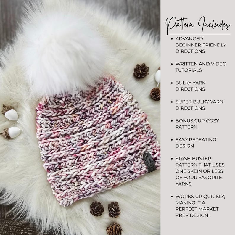 May include: A knit beanie with a large white faux fur pom-pom, featuring a variegated yarn pattern in shades of pink, white, and grey. A small dark tag is attached to the side. The text reads: Pattern Includes Advanced Beginner Friendly Directions, Written and Video Tutorials, Bulky Yarn Directions, Super Bulky Yarn Directions, Bonus Cup Cozy Pattern, Easy Repeating Design, Stash Buster Pattern, Works Up Quickly.