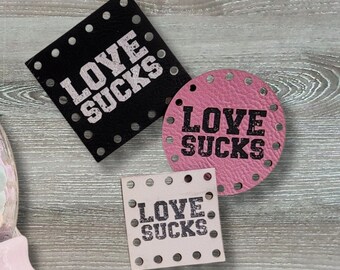 Love Sucks Patch ~ Valentine Tag ~ Galentine Labels ~ 18 color choices ~ 3 sizes ~ Vegan Faux Leather ~ Handmade ~ Crochet ~ Knit