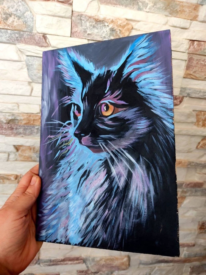 May include: A painting of a black cat with blue and purple fur. The cat's eyes are yellow and it is looking to the right. The painting is on a black background.