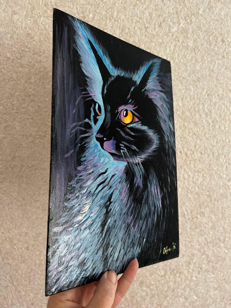 May include: A black cat with bright yellow eyes is painted on a black canvas. The cat's fur is painted with shades of blue and purple, creating a vibrant and colorful effect.