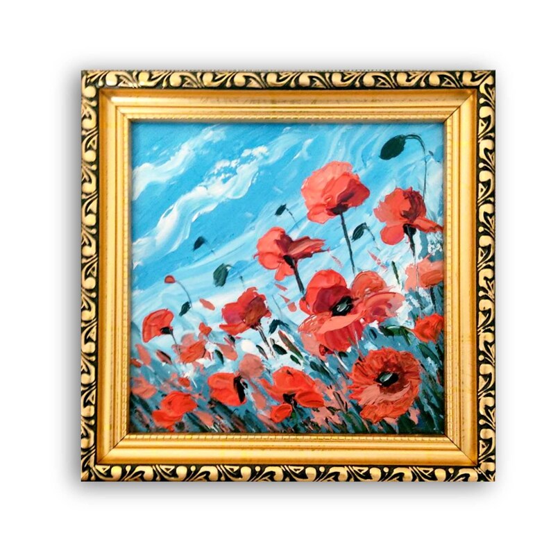 May include: A framed painting depicting a field of red poppies against a blue sky with white clouds. The painting is executed in a loose, impressionistic style.