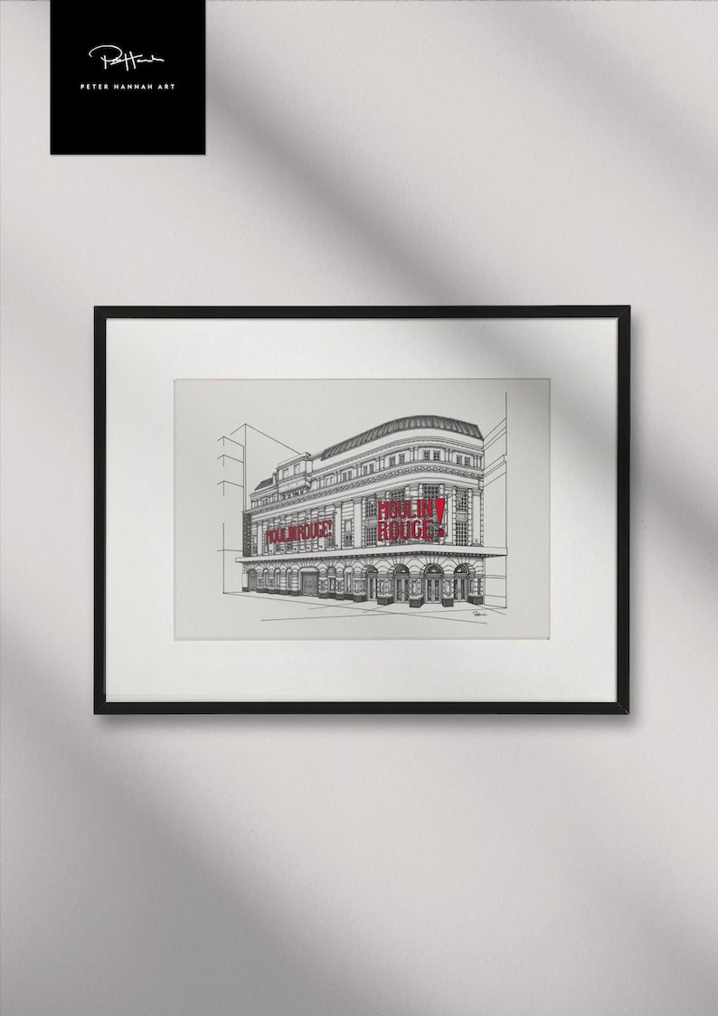 May include: A framed black and white architectural print of the Moulin Rouge. The words "MOULIN ROUGE" are in red. The artist's signature is in the top left corner. The print is in a black frame.