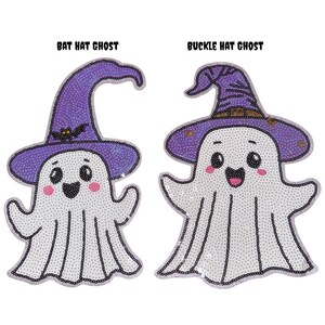 May include: Two Halloween-themed ghost designs. One ghost wears a purple bat hat, the other a purple buckle hat. Both ghosts have white bodies with black sequin outlines, pink cheeks, and smiling faces. The text "BAT HAT GHOST" and "BUCKLE HAT GHOST" are above each ghost.
