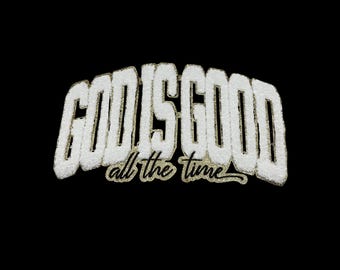 May include: White embroidered patch with the text "GOD IS GOOD all the time" in black lettering.