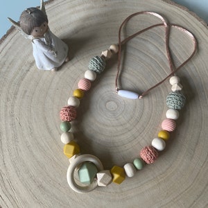 Nursing or carrying necklace in eucalyptus green, terra cotta and mustard yellow