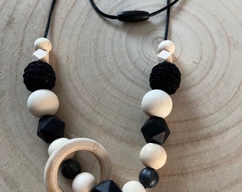 Black and wood tone nursing or carrying necklace