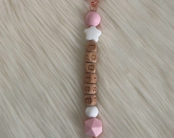 Personalized keyring in wood and pink tone silicone