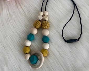 Emerald green and mustard yellow nursing or carrying necklace