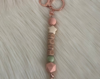 Personalized keyring in wood and silicone, salmon tone and eucalyptus green