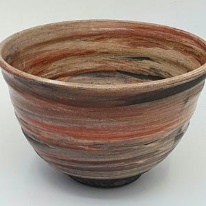 Raku teabowl with iron glaze, chawan &#39;Ido&#39; type.