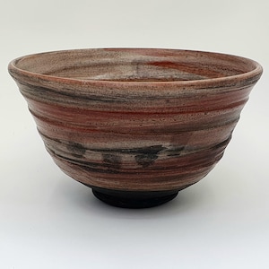 Raku teabowl with iron glaze, chawan &#39;Ido&#39; type.