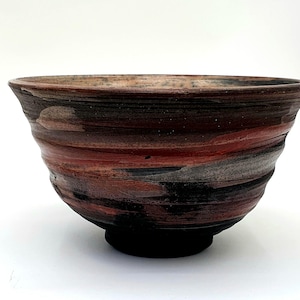 Raku teabowl with iron glaze, chawan &#39;Ido&#39; type.