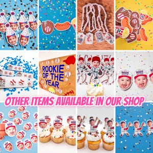 May include: A collection of baseball-themed party decorations and cupcake toppers. The image includes cupcake toppers with a baby's face, baseball-themed banners, and baseball-shaped confetti. Text on the banner reads "ROOKIE OF THE YEAR".