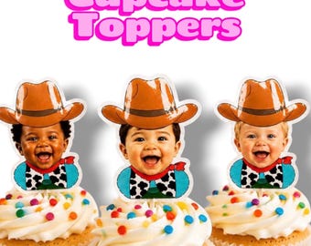 May include: Three cupcake toppers featuring the text Cupcake Toppers in pink. Each topper shows a baby wearing a brown cowboy hat and a blue shirt with a black and white cow print vest. The toppers are placed on cupcakes with white frosting and colorful sprinkles.