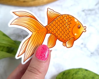 Pegatina de vinilo brillante de 3,5" con diseño de pez dorado.