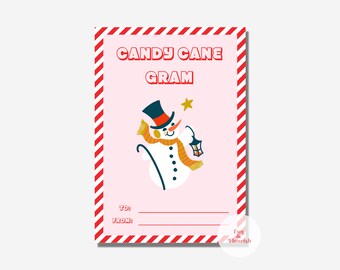 May include: A pink printable card with a red and white striped border. The card says "Candy Cane Gram" and features a cartoon snowman with a black top hat, orange scarf, and a lantern. The card has blank lines for "To:" and "From:" and a small logo that says "Fun & Flourish".
